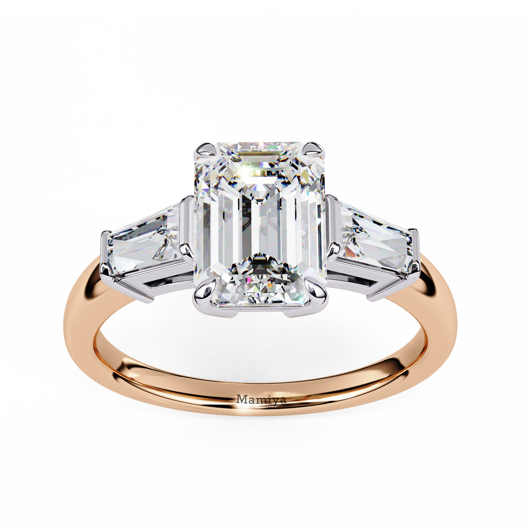 emerald solitaire with baguette three stone engagement ring