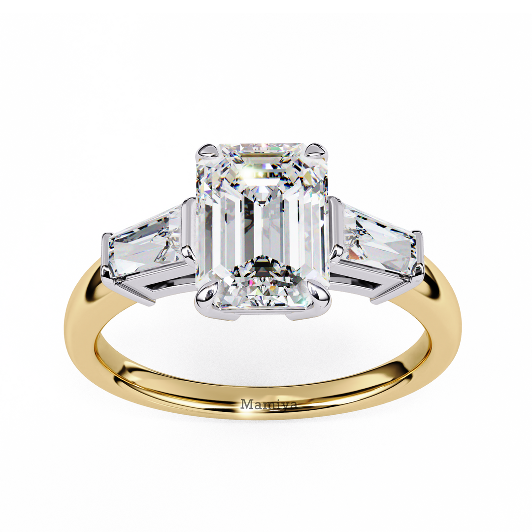 emerald solitaire with baguette three stone engagement ring