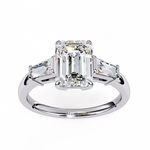 Load image into Gallery viewer, emerald solitaire with baguette three stone engagement ring
