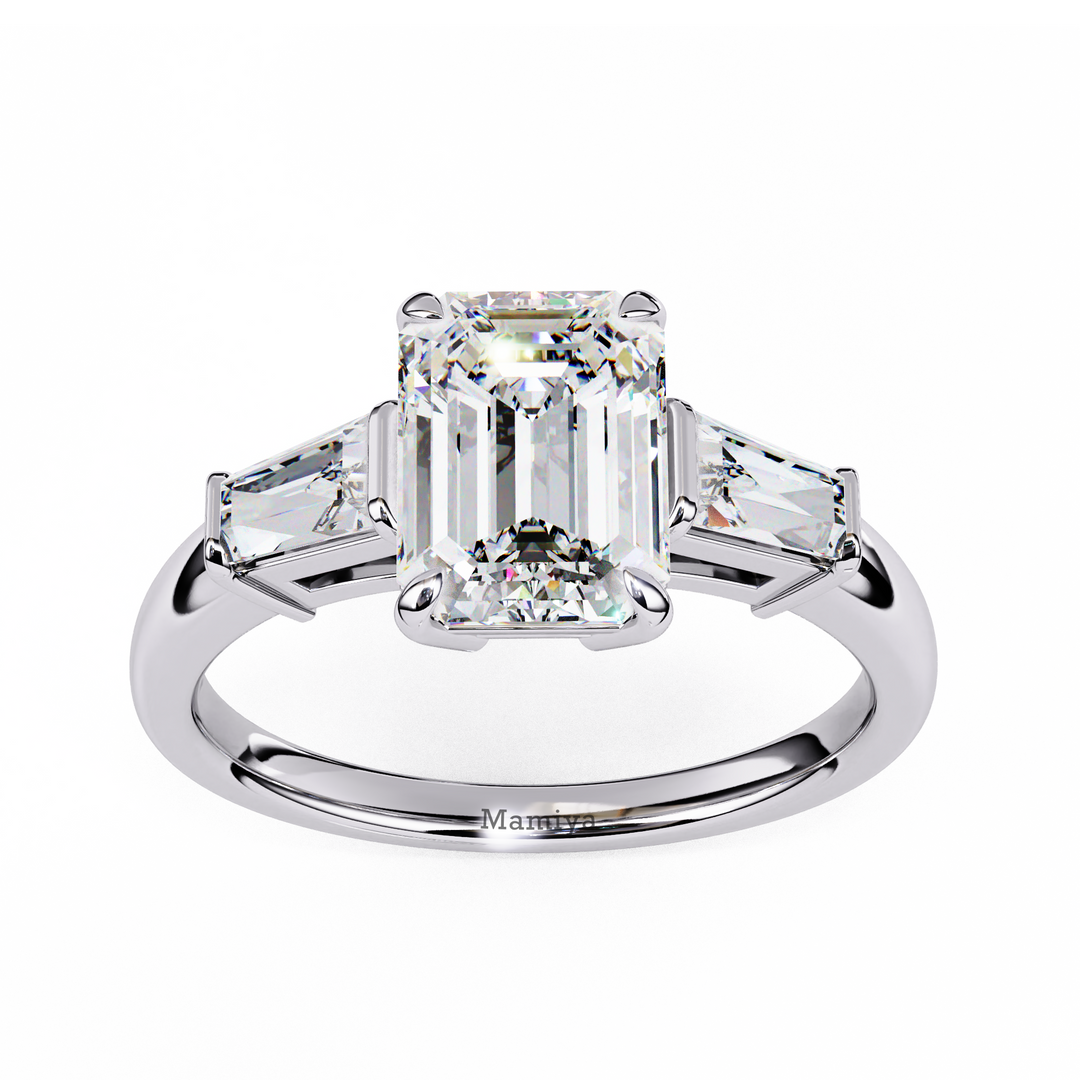 emerald solitaire with baguette three stone engagement ring