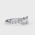 Load and play video in Gallery viewer, Three stone emerald cut engagement ring
